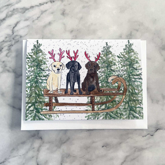 Puppies Sledging Christmas Card